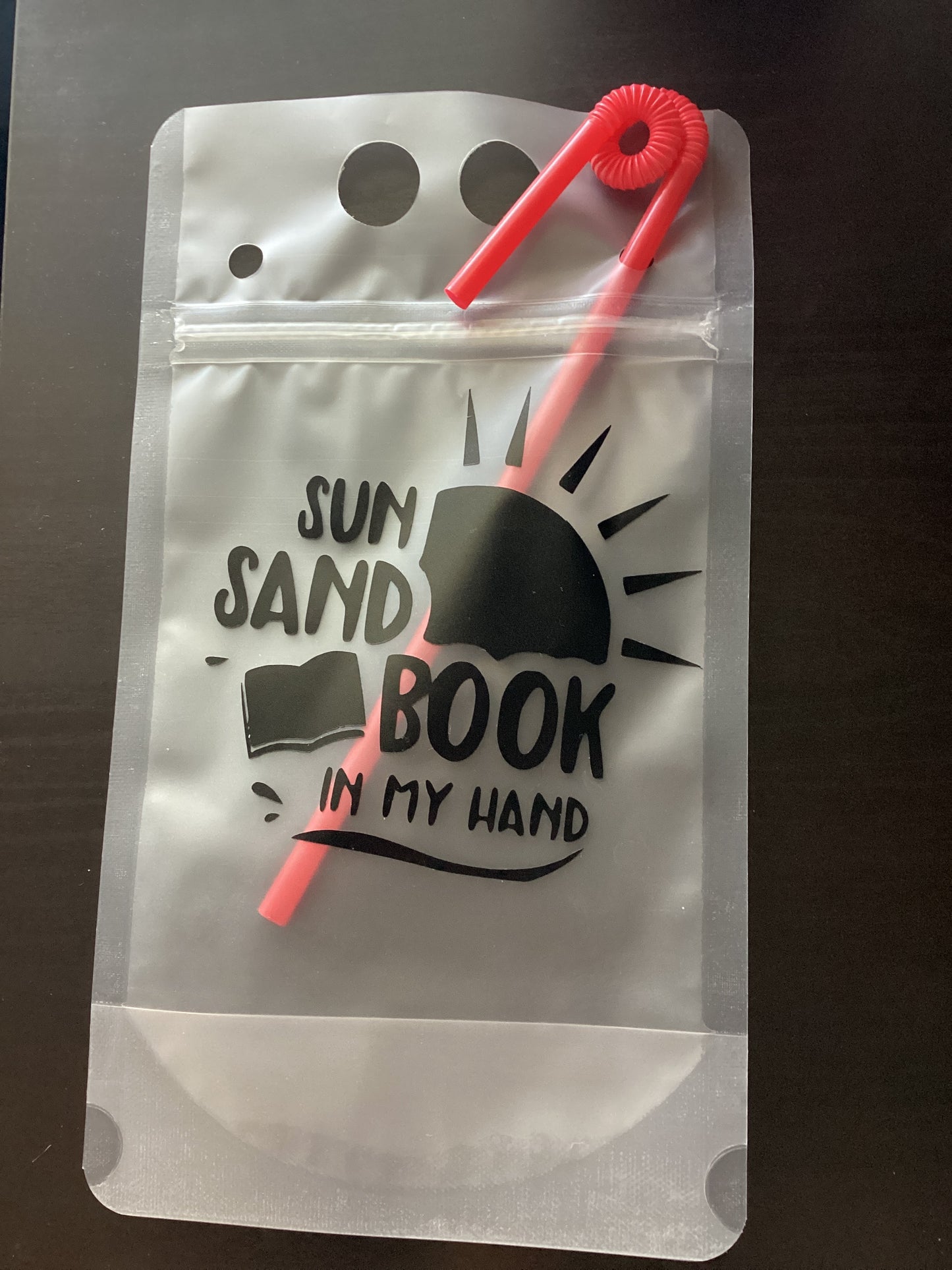 Sun sand book in my hand